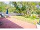 Backyard with patio, shed, garden and mature trees at 7065 73Rd N St, Pinellas Park, FL 33781