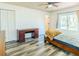 Bedroom with lots of light and wood-look flooring at 7065 73Rd N St, Pinellas Park, FL 33781