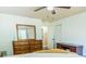 Spacious bedroom with wood flooring and overhead fan at 7065 73Rd N St, Pinellas Park, FL 33781