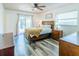 Comfortable bedroom with sliding glass door and natural light at 7065 73Rd N St, Pinellas Park, FL 33781