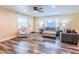 Comfortable living room with natural light, wood floors, and neutral decor at 7065 73Rd N St, Pinellas Park, FL 33781