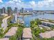 Aerial view of condos near Channelside with lush landscaping and a beautiful water view at 741 Mainsail Dr, Tampa, FL 33602