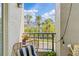 Cozy balcony with striped pillow and city views, perfect for relaxing outdoors at 741 Mainsail Dr, Tampa, FL 33602
