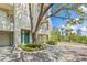 An inviting exterior view showcases the architecture and landscaping of this multi-story home at 741 Mainsail Dr, Tampa, FL 33602