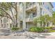An inviting exterior view showcases the architecture and landscaping of this multi-story home at 741 Mainsail Dr, Tampa, FL 33602