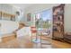 Bright living space with a staircase, large window offering cityscape views, and modern decor at 741 Mainsail Dr, Tampa, FL 33602