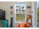 Inviting space with scenic window view, comfortable seating and city buildings in the distance at 741 Mainsail Dr, Tampa, FL 33602