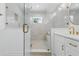 Elegant bathroom featuring a frameless shower, sleek vanity, and modern fixtures in a bright space at 791 44Th N Ave, St Petersburg, FL 33703