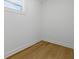 Bright bedroom featuring wood-look flooring and natural light from a window at 791 44Th N Ave, St Petersburg, FL 33703