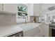 The kitchen showcases a white farmhouse sink and a window with natural light at 791 44Th N Ave, St Petersburg, FL 33703