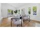 Bright living space with modern furniture, access to an outdoor area, and light wood flooring at 791 44Th N Ave, St Petersburg, FL 33703