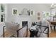 Bright living space with modern fireplace, stylish decor, and light wood flooring for a cozy atmosphere at 791 44Th N Ave, St Petersburg, FL 33703