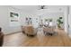 Cozy living room with ample seating, light wood floors, and plenty of natural light at 791 44Th N Ave, St Petersburg, FL 33703