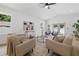 Inviting living room with neutral tones, modern furnishings, and access to the outdoor area at 791 44Th N Ave, St Petersburg, FL 33703