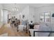 Open-concept living space featuring bright white walls, modern decor, and access to an outdoor area at 791 44Th N Ave, St Petersburg, FL 33703