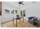 Bright home office featuring a modern desk, ample light, and serene outdoor views at 791 44Th N Ave, St Petersburg, FL 33703