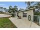 Backyard patio with a barbecue grill and seating area, perfect for outdoor gatherings at 8060 Timberlake Ave, Spring Hill, FL 34606