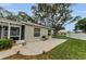 Back patio featuring a grill and space for outdoor dining, perfect for relaxation and entertainment at 8060 Timberlake Ave, Spring Hill, FL 34606