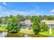Aerial view of a private backyard oasis with a screened pool and waterfront access at 8127 Siquita Ne Dr, St Petersburg, FL 33702