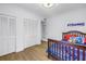 Star Wars themed bedroom with closet and wood floors at 8127 Siquita Ne Dr, St Petersburg, FL 33702