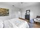 Cozy bedroom with wood floors, closet and comfortable furniture at 8127 Siquita Ne Dr, St Petersburg, FL 33702