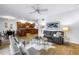 Open concept living room and kitchen with dark wood cabinets and french doors at 8127 Siquita Ne Dr, St Petersburg, FL 33702