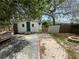 Home's backyard with shed and fire pit at 834 Grand Central St, Clearwater, FL 33756