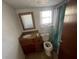Bathroom featuring a vanity, toilet, and shower with shower curtain at 834 Grand Central St, Clearwater, FL 33756