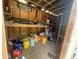 Wooden shed with workbench, storage, and buckets of paint at 834 Grand Central St, Clearwater, FL 33756