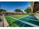 Active shuffleboard courts with covered seating and lighting for daytime and evening play at 860 Maclaren N Dr # A, Palm Harbor, FL 34684