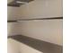A closet featuring multiple shelves providing ample storage space, perfect for organization at 9831 83Rd Way, Seminole, FL 33777