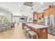 Well-equipped kitchen with a center island, stainless appliances, and an open view to the living area at 10724 Cory Lake Dr, Tampa, FL 33647