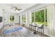 A versatile living space is illuminated by natural light and provides views of the landscaped yard at 11628 Aspenwood Dr, New Port Richey, FL 34654