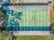 Aerial view of shuffleboard courts providing a fun outdoor activity in the community for residents at 11628 Aspenwood Dr, New Port Richey, FL 34654