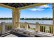 View from inside the community gazebo showing lakeside scenery at 11813 Crawford Parrish Ln, Parrish, FL 34219