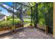 Paver patio with potted plants and lush greenery at 11813 Crawford Parrish Ln, Parrish, FL 34219