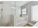 Stylish bathroom with a soaking tub and separate shower at 12102 Steppingstone Blvd, Tampa, FL 33635