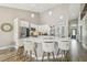 Stunning open kitchen with a center island, seating, stainless steel appliances, and modern decor at 12102 Steppingstone Blvd, Tampa, FL 33635