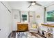 Charming Bedroom with a large window, rocking chair and a stylish accent rug at 1213 E Idlewild Ave, Tampa, FL 33604