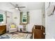 Cozy Bedroom room features a crib, changing table, area rug and a comfortable rocking chair at 1213 E Idlewild Ave, Tampa, FL 33604