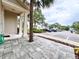 Exterior view of the home with a tiled entryway, decorative rocks and landscaping at 12268 Country White Cir, Tampa, FL 33635