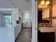 View of the open floor plan, featuring the kitchen, bathroom and patio at 12268 Country White Cir, Tampa, FL 33635