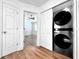 Convenient laundry area with stacked washer and dryer units, located near bedrooms at 12268 Country White Cir, Tampa, FL 33635