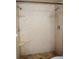 Tiled shower in the bathroom featuring two shower heads and tiled shelving at 12488 Harper St, Spring Hill, FL 34609