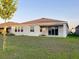 The backyard has a view of the neighborhood at 13014 Willow Grove Dr, Riverview, FL 33579