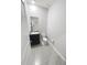 Well-lit half bathroom features granite counters, undermount sink, and gray floor tiles at 13014 Willow Grove Dr, Riverview, FL 33579