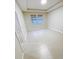Bedroom with tile flooring and window at 13014 Willow Grove Dr, Riverview, FL 33579