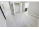 Bright bedroom with neutral paint, carpet flooring, and a walk-in closet at 13014 Willow Grove Dr, Riverview, FL 33579