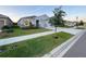 Charming single-Gathering home showcasing manicured lawn and lovely landscaping at 13014 Willow Grove Dr, Riverview, FL 33579