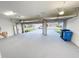 Two-car garage with automatic door at 13014 Willow Grove Dr, Riverview, FL 33579
